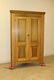 Poplar 2-door corner cupboard with molded cornice and