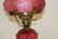 Fenton cranberry table lamp with molded rose font and - 6