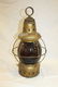 Painted tin lantern with deep ruby globe marked G. T.