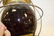 Painted tin lantern with deep ruby globe marked G. T. - 4
