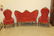 Walnut Victorian carved back settee, rocker and chair