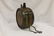 Early canteen with metal straps and chain. With