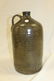 Slip glaze tall Southern pottery jug with stamped "JM"
