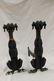 Contemporary pair of Whippett andirons with painted fee