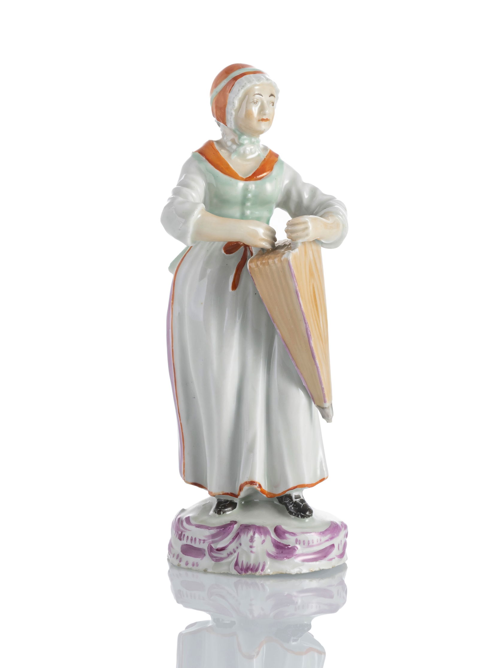 A PEASANT WOMAN WITH BELLOWS: A PEASANT WOMAN WITH BELLOWSLimbach, ca. 1780/85H. 15 cmRocaille base, without marks, minute chips.Jan Ahlers CollectionBäuerin mit BlasbalgLimbach, um 1780/85H. 15 cmRocaillesockel, ohne Marke.