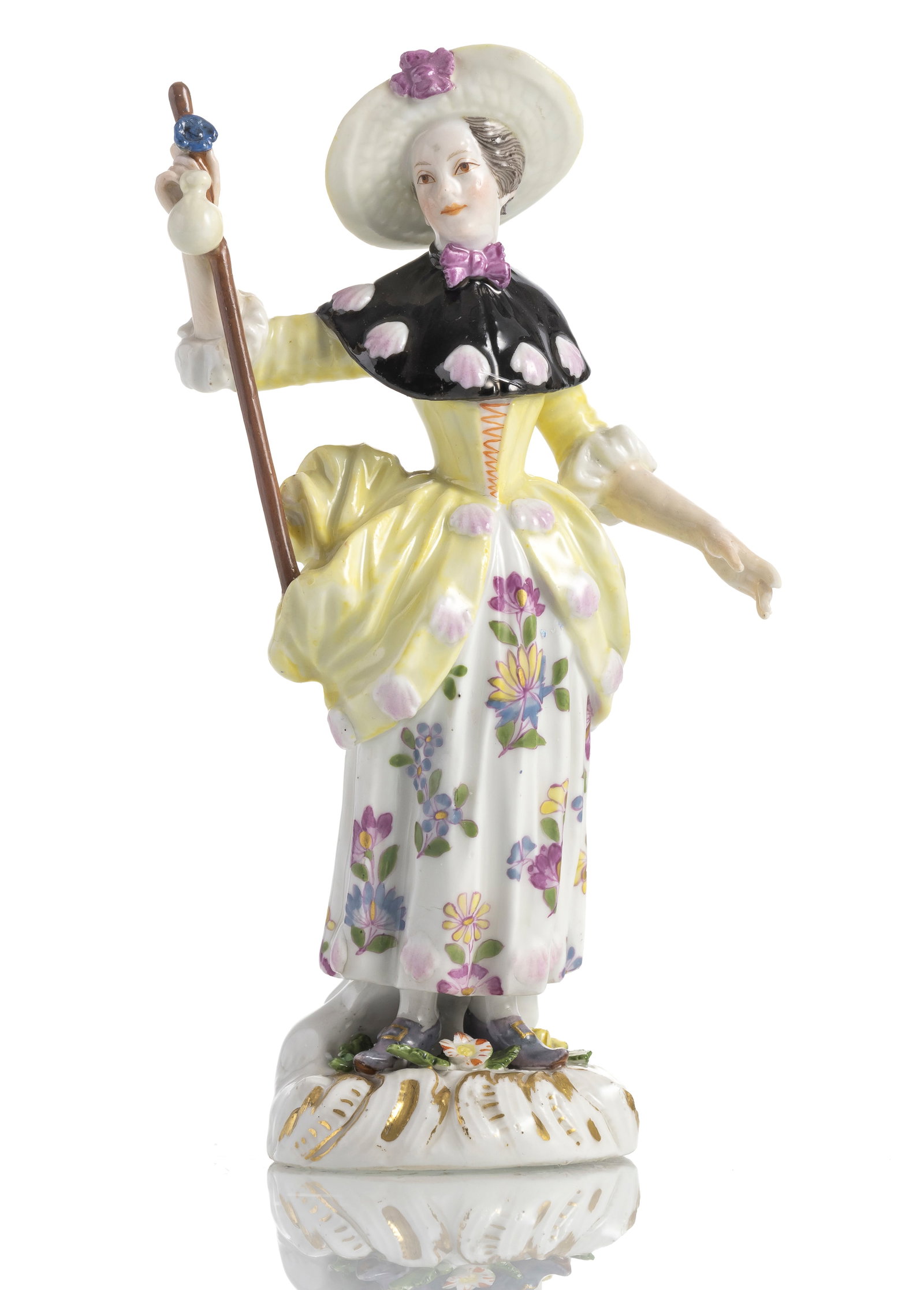 A MEISSEN FIGURINE OF A FEMALE PILGRIM: A MEISSEN FIGURINE OF A FEMALE PILGRIMca. 1750H. 15,5 cmModel by Johann J. Kaendler. Polychrome painted, without mark. Min. chipped, slightly rest. Figur einer PilgerinMeissen, um 1750H. 15,5 cmModell