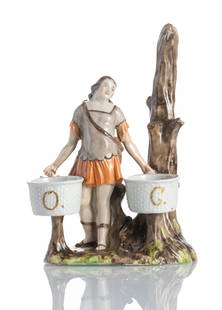 A SPICE STAND WITH HUNTER - OR AMOR WITH ARROWS: A SPICE STAND WITH HUNTER - OR AMOR WITH ARROWSWallendorf, circa 1775H. 19 cmThe spice baskets marked ‘O.’ and ‘C.’ in gold, mark w in underglaze blue. The tree, hands and