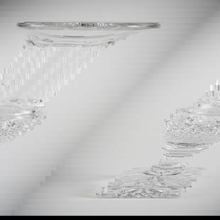 A LARGE SAINT LOUIS GLASS "MEDICI" VASE: A LARGE SAINT LOUIS GLASS "MEDICI" VASESaint Louis Cristallerie de FranceH. 30 cmModel "Versailles". Colourless glass, diamond cut at the body. Original company label to rim and etched signature at