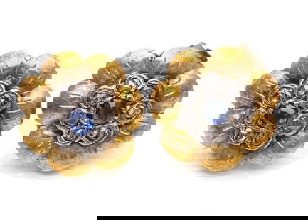 GOLD EAR CLIPS: GOLD EAR CLIPSAround 1930/40&#216; 1,5 cm750/000 yellow gold with silver. 14 diamond roses totaling approx. 0.10 ct (estimated) of low quality. Two blue sapphires. Some gemstones slightly chipped. 835