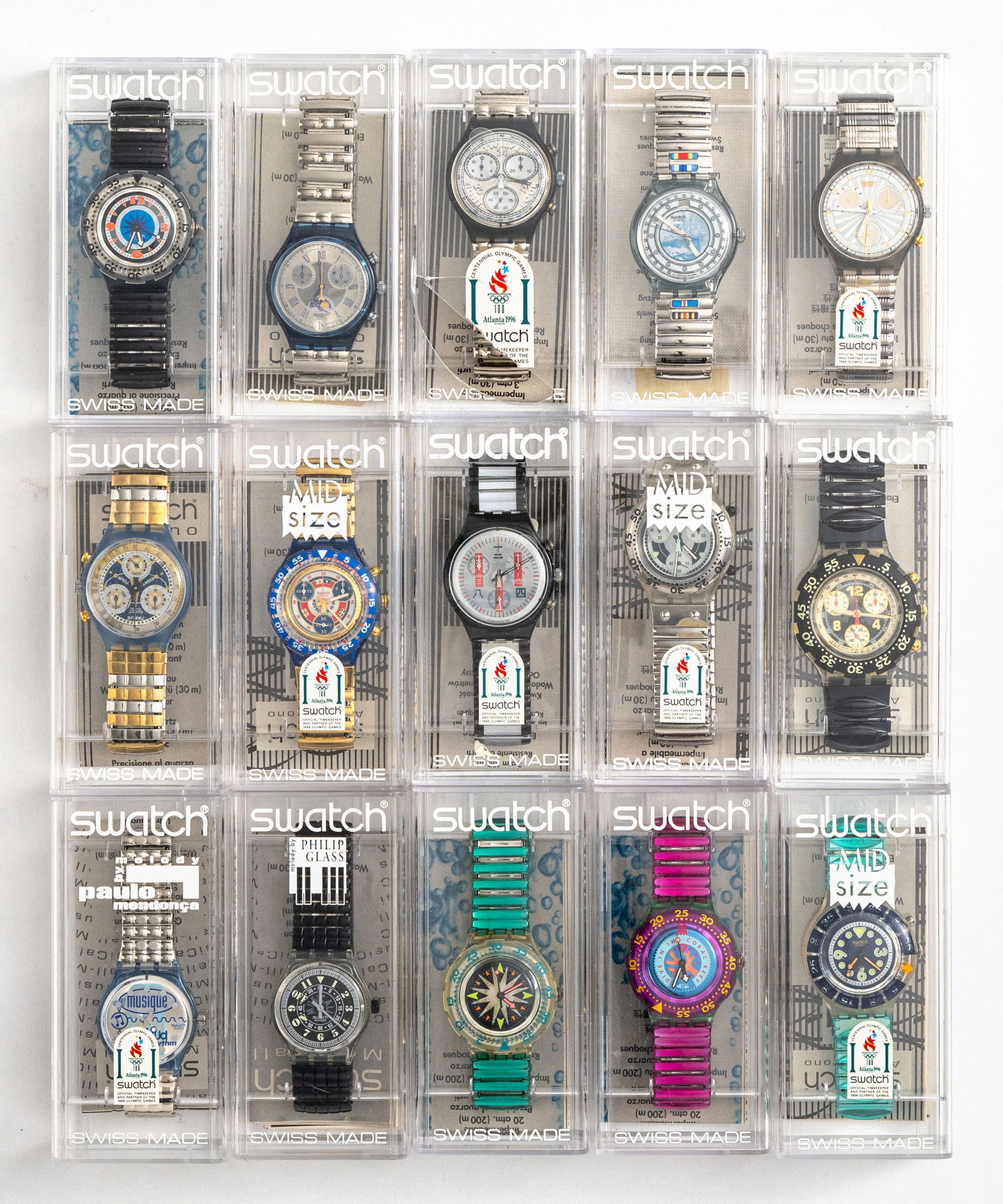 Mixed lot of 15 Swatch watches: Mixed lot of 15 Swatch watches Various editions, plastic bracelet with elasticated strap, water-resistant, quartz movement not tested for functionality, batteries must be replaced, with case.