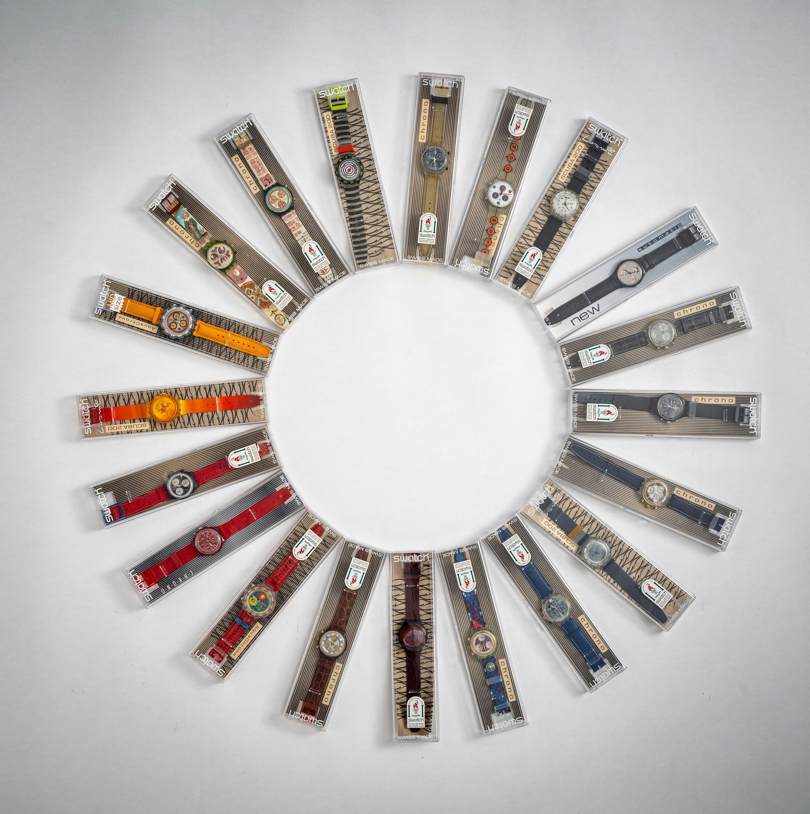 Mixed lot of 20 Swatch watches: Mixed lot of 20 Swatch watches Various editions, plastic and leather straps, water-resistant, quartz movement not tested for functionality, batteries must be replaced, with case. Collection Monika