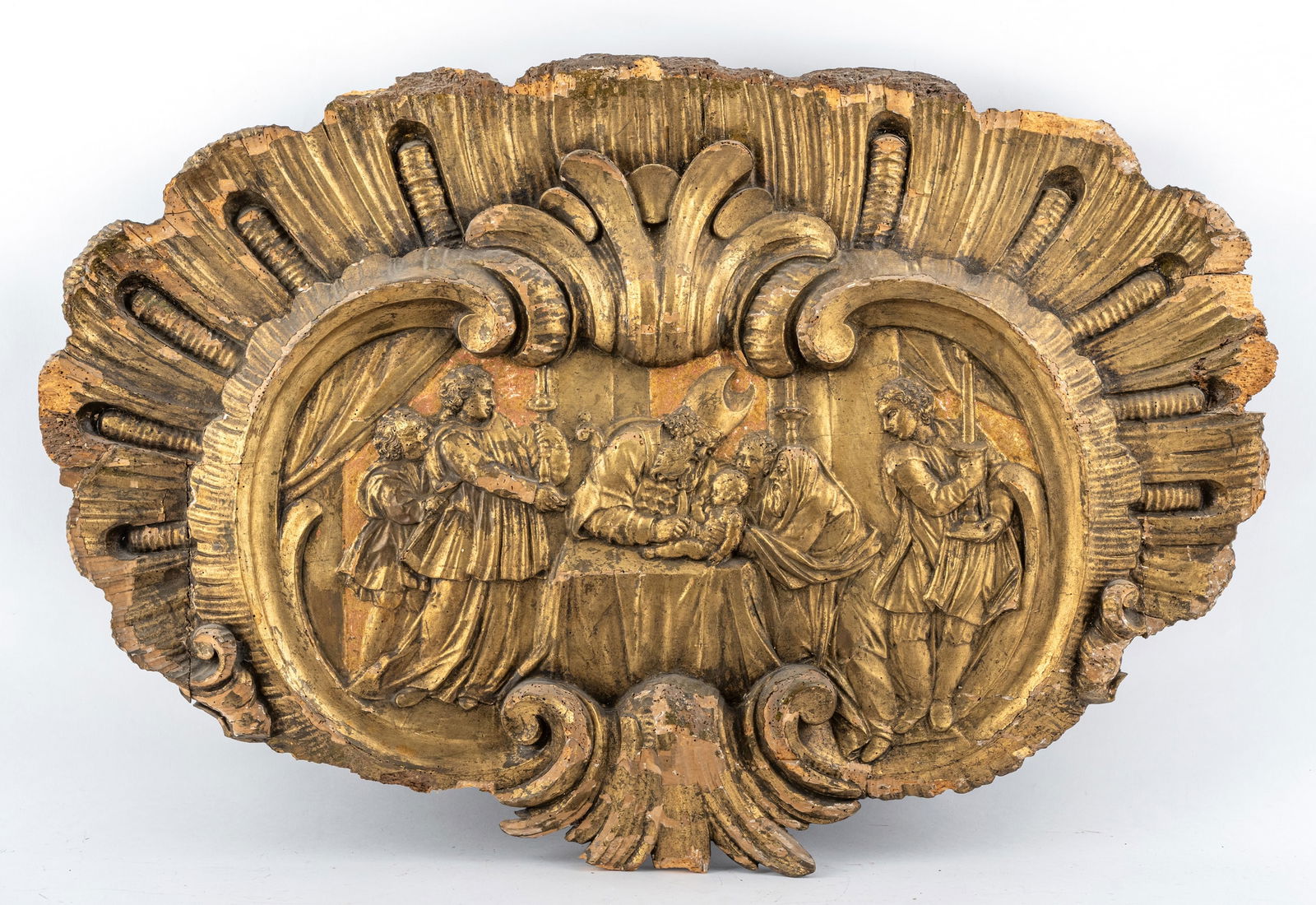 A CARVED AND GILTWOOD RELIEF CARTOUCHE: A CARVED AND GILTWOOD RELIEF CARTOUCHE 18th century 114 x 76,5 cm Depicting the Circumcision of Christ. Damages, losses.Reliefkartusche 18. Jhdt. 114 x 76,5 cm Beschneidung Christi. Holz, geschnitzt