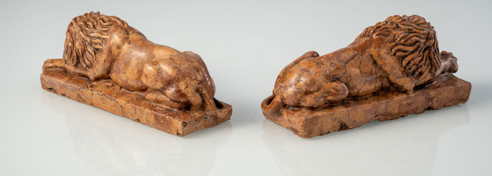 A PAIR OF ROSSO DI VERONA MARBLE LIONS - 2