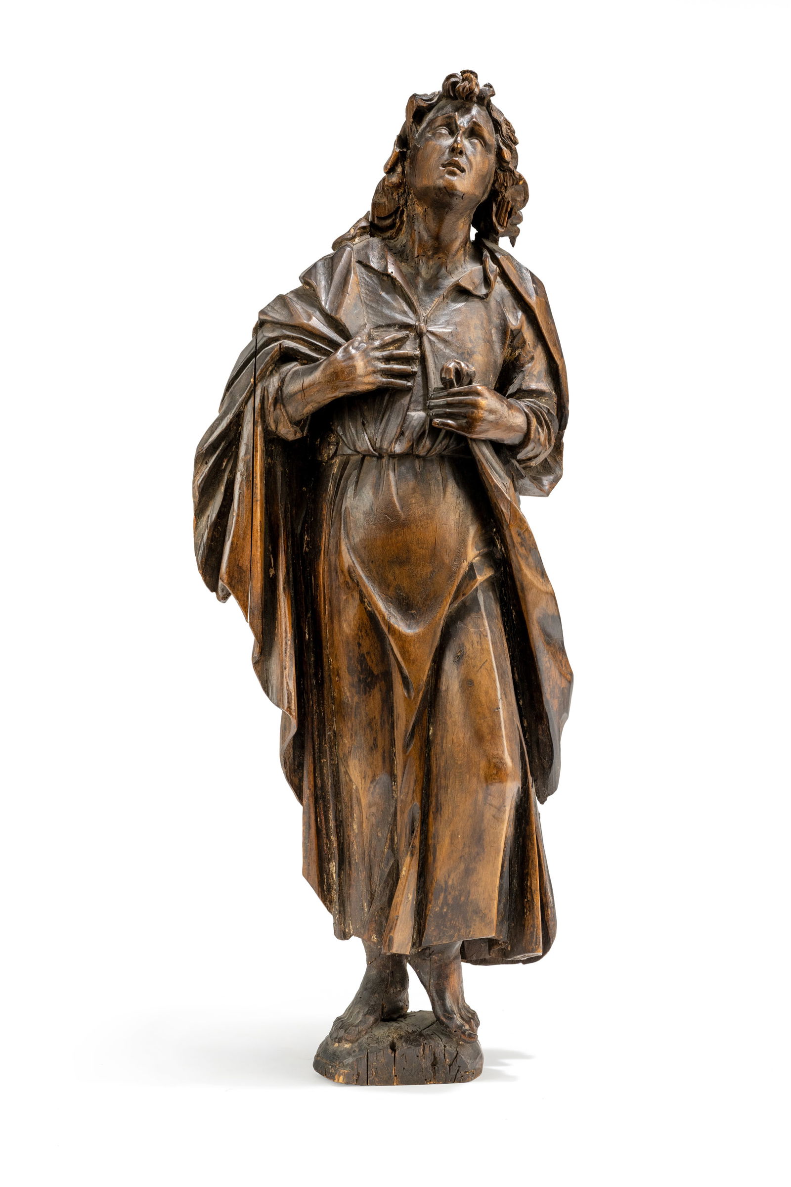 MOURNING ST. JOHN: MOURNING ST. JOHN 18th century H. 88,5 cm Standing figure of the Saint. Broadleaf wood, carved with hollowed back, brown varnished. Losses, significant damages due to age. Old private collection