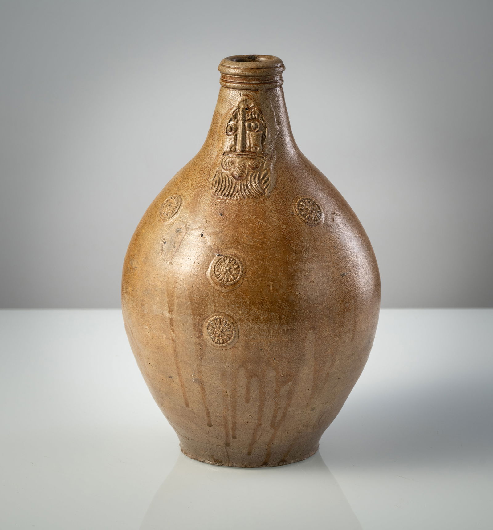 A LARGE RHENISH STONEWARE "BARTMANNS" JAR (1 of 5)