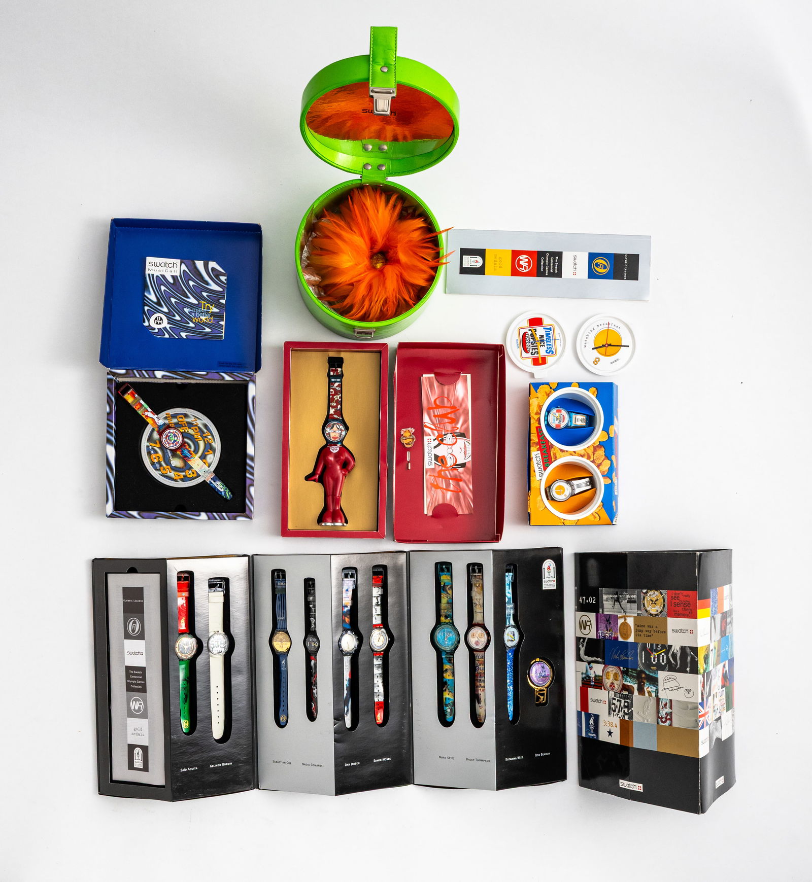 Mixed lot of 15 Swatch watches: Mixed lot of 15 Swatch watches Various special editions including Olympic Edition "Olympic Legends" from 1996 and "Breakfast", leather and plastic bracelets, used, water-resistant, quartz movement