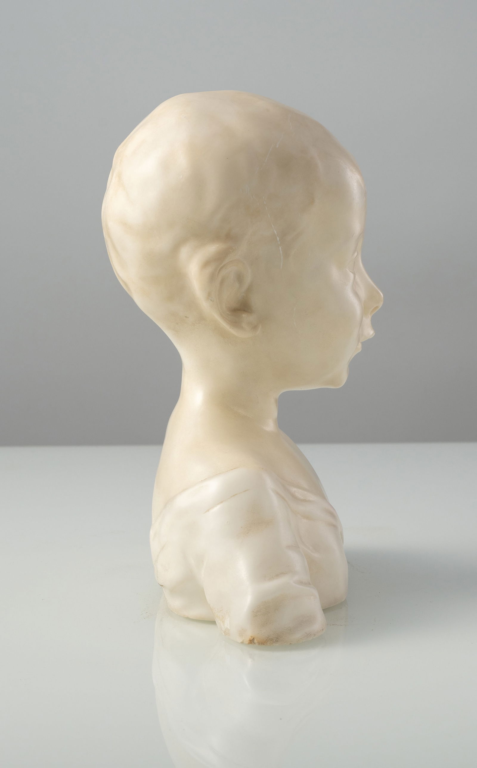 A WHITE MARBLE BUST OF A BOY - 3
