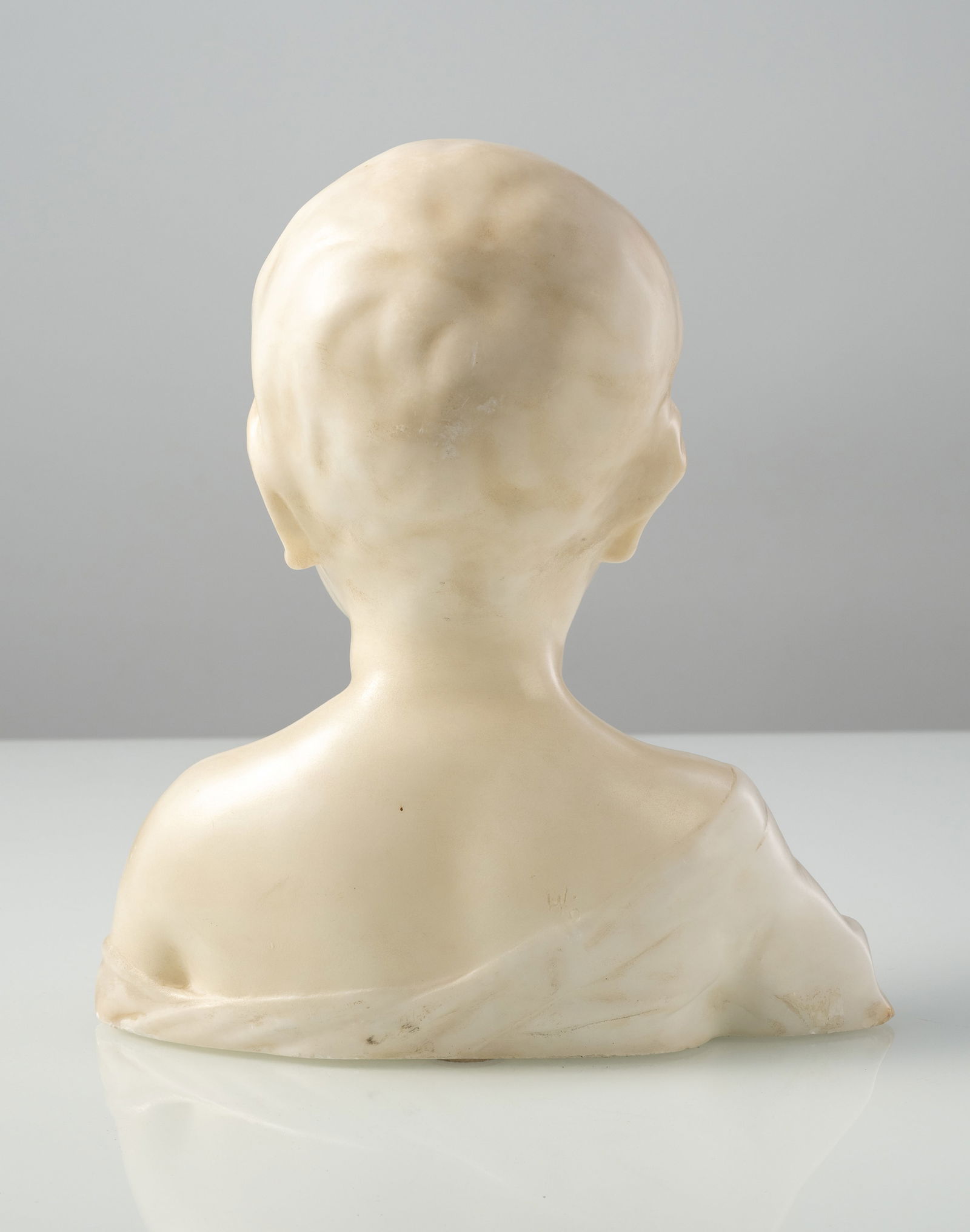 A WHITE MARBLE BUST OF A BOY - 4