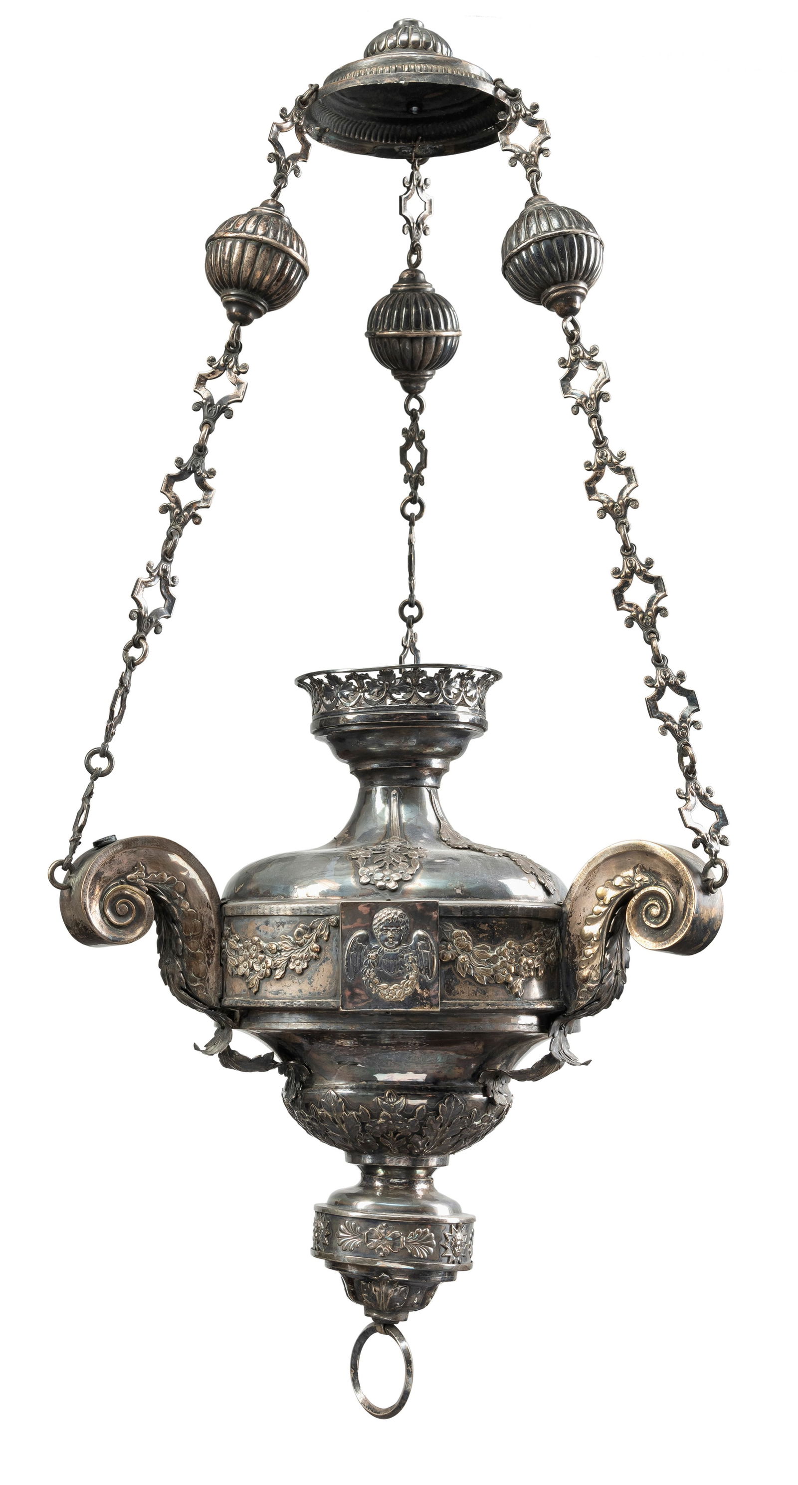 A METALPLATED CHRUCH CHANELIER: A METALPLATED CHRUCH CHANELIER South German, ca. 1800 H. ca. 88 cm Relief pattern of putti, garlands and foliage. Hanging on three chains with godronized balls.Kirchenampel Süddeutsch, um 1800