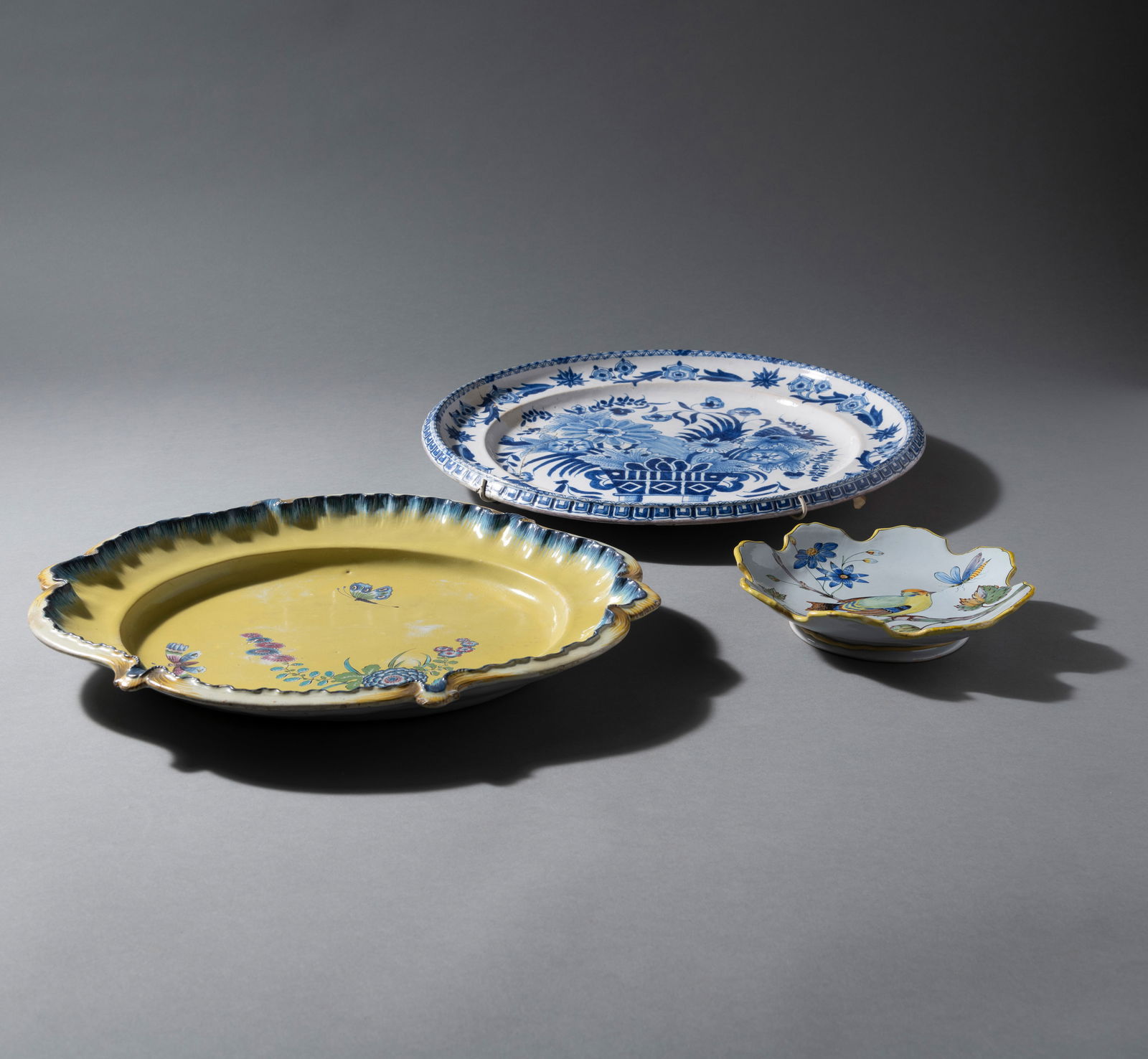 TWO FAIENCE DISHES AND A PLATE - 2