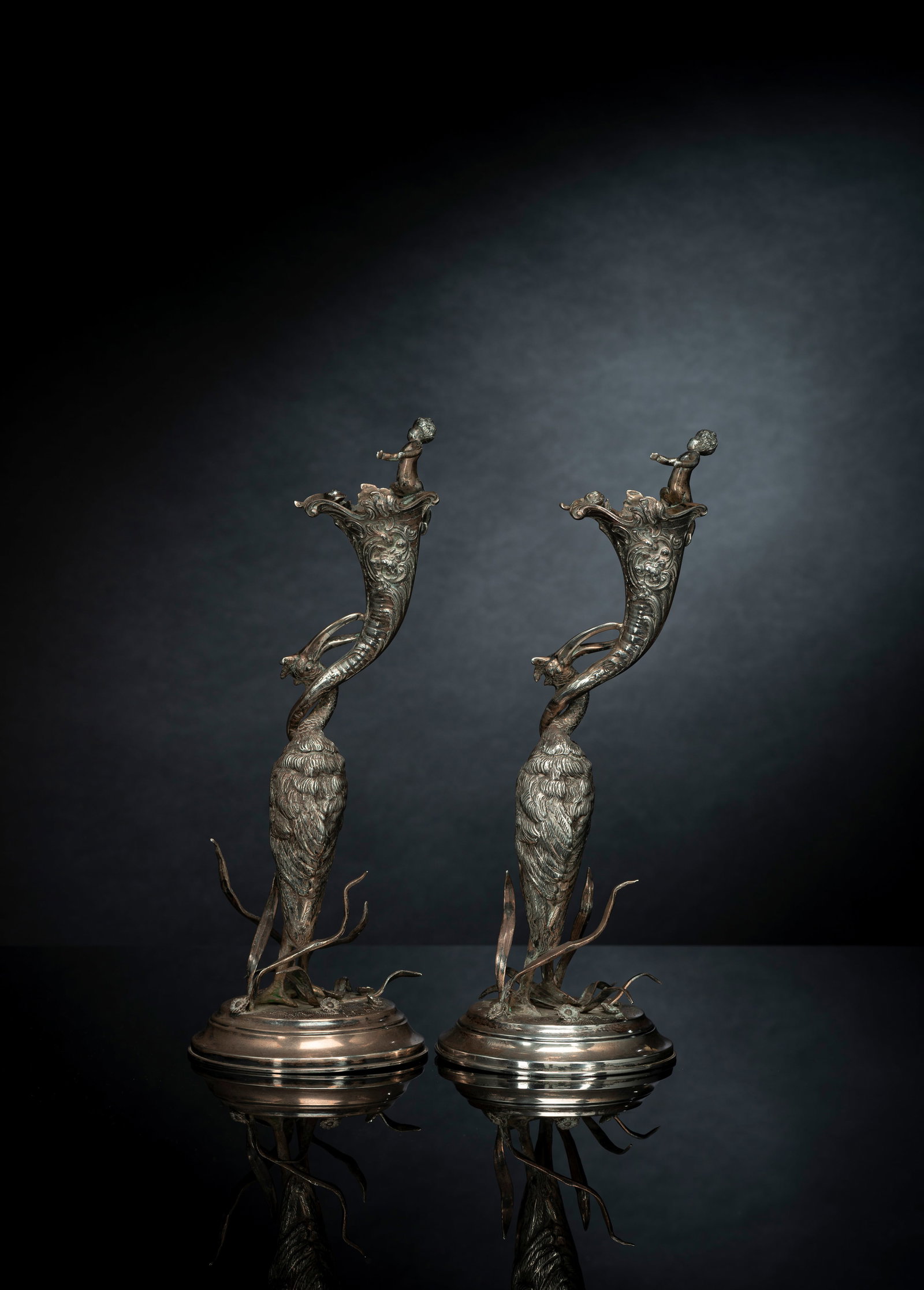 TWO FIGURAL SILVER CANDLESTICKS WITH CRANE AND PUTTI - 2