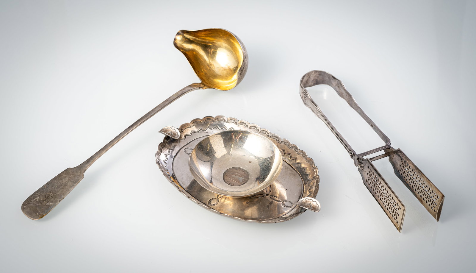 A SOUP LADLE; ASPARAGUS TONGS, ASHTRAY AND SMALL DISH - 2
