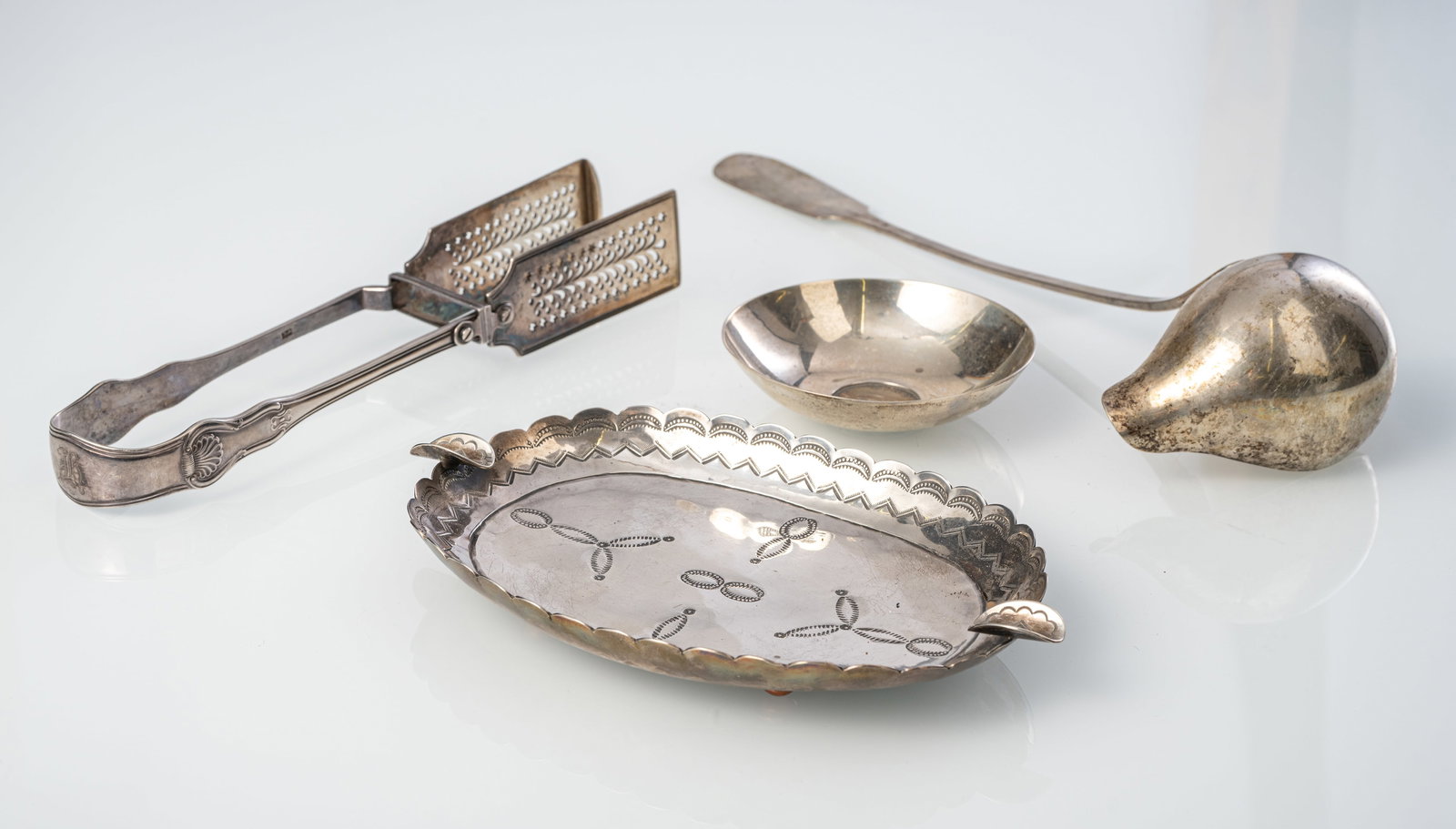 A SOUP LADLE; ASPARAGUS TONGS, ASHTRAY AND SMALL DISH - 4