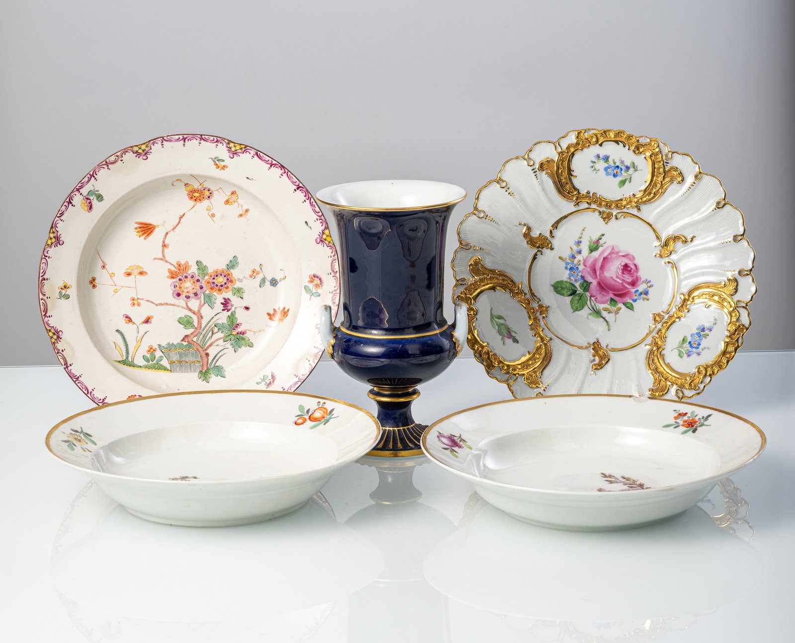 FOUR PLATES AND A VASE - 2