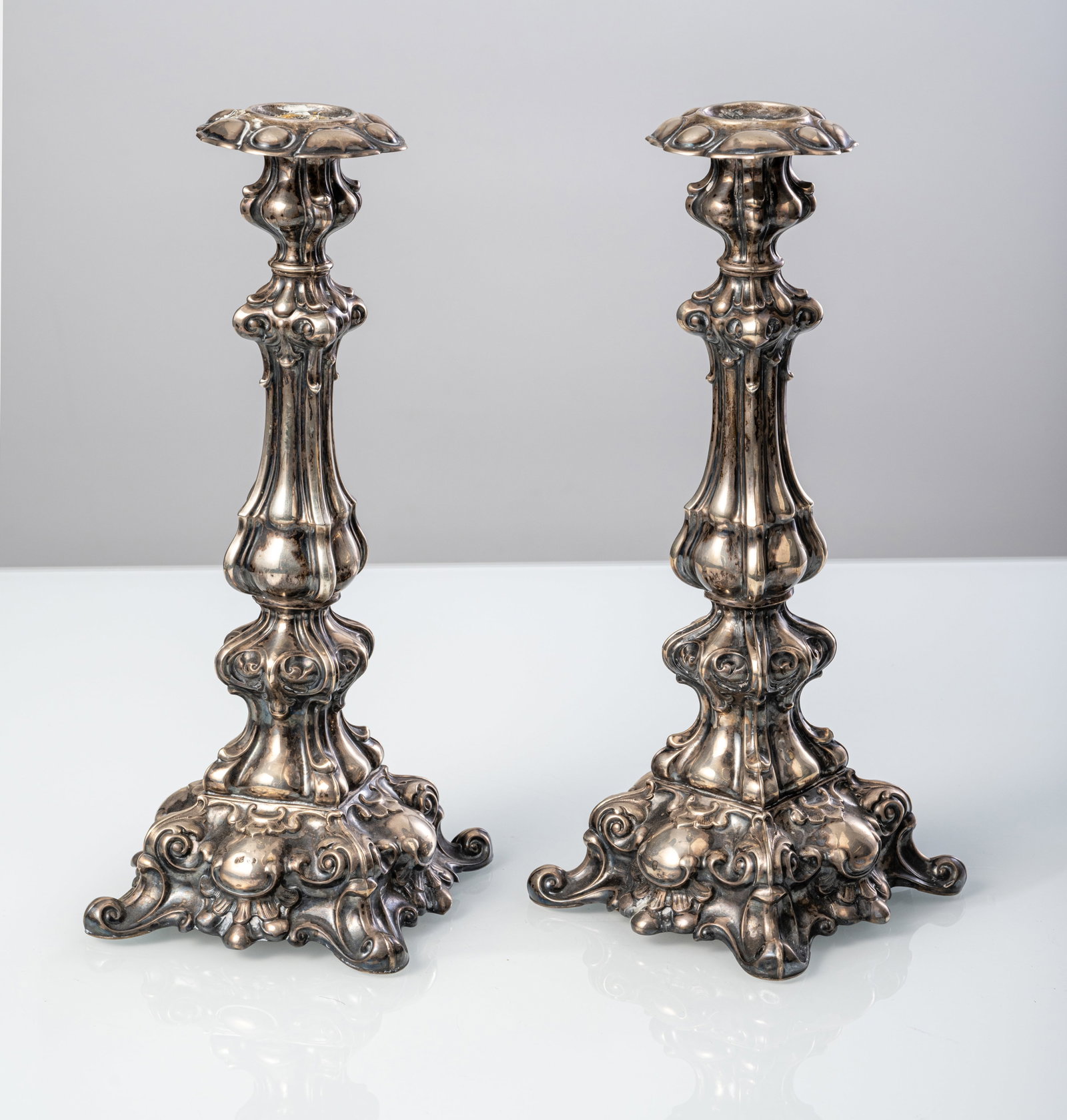 A PAIR OF SILVER CANDLESTICKS AND A TEA CADDY - 3