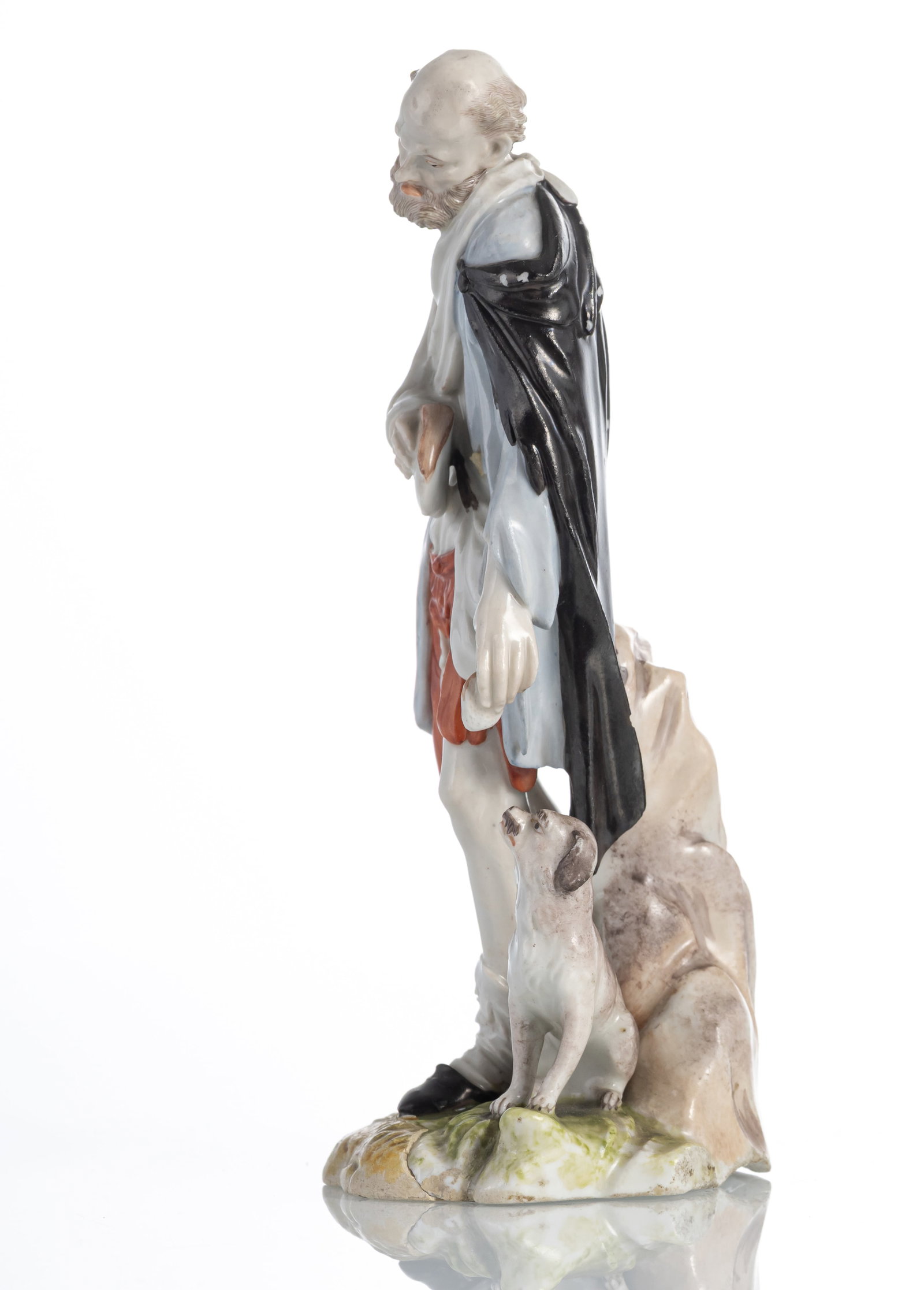 A LUDWIGSBURG FIGURE OF A BEGGAR WITH DOG - 2