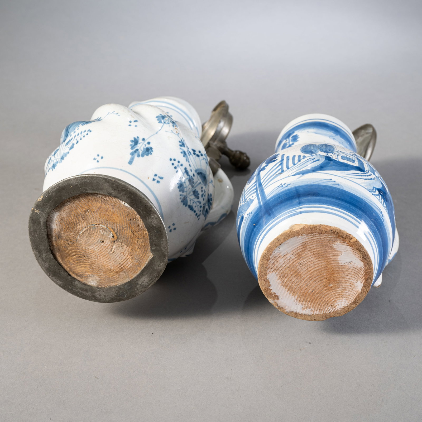 TWO GERMAN BLUE AND WHITE PAINTED FAIENCE JARS - 4