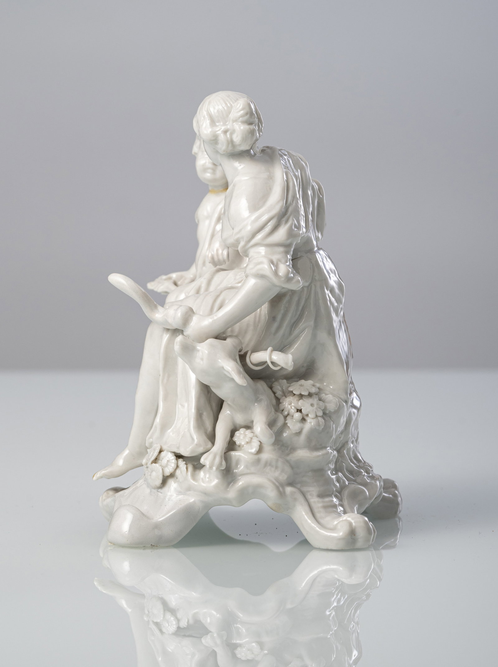 A WHITE PORCELAIN GROUP OF VENUS AND CUPID - 4