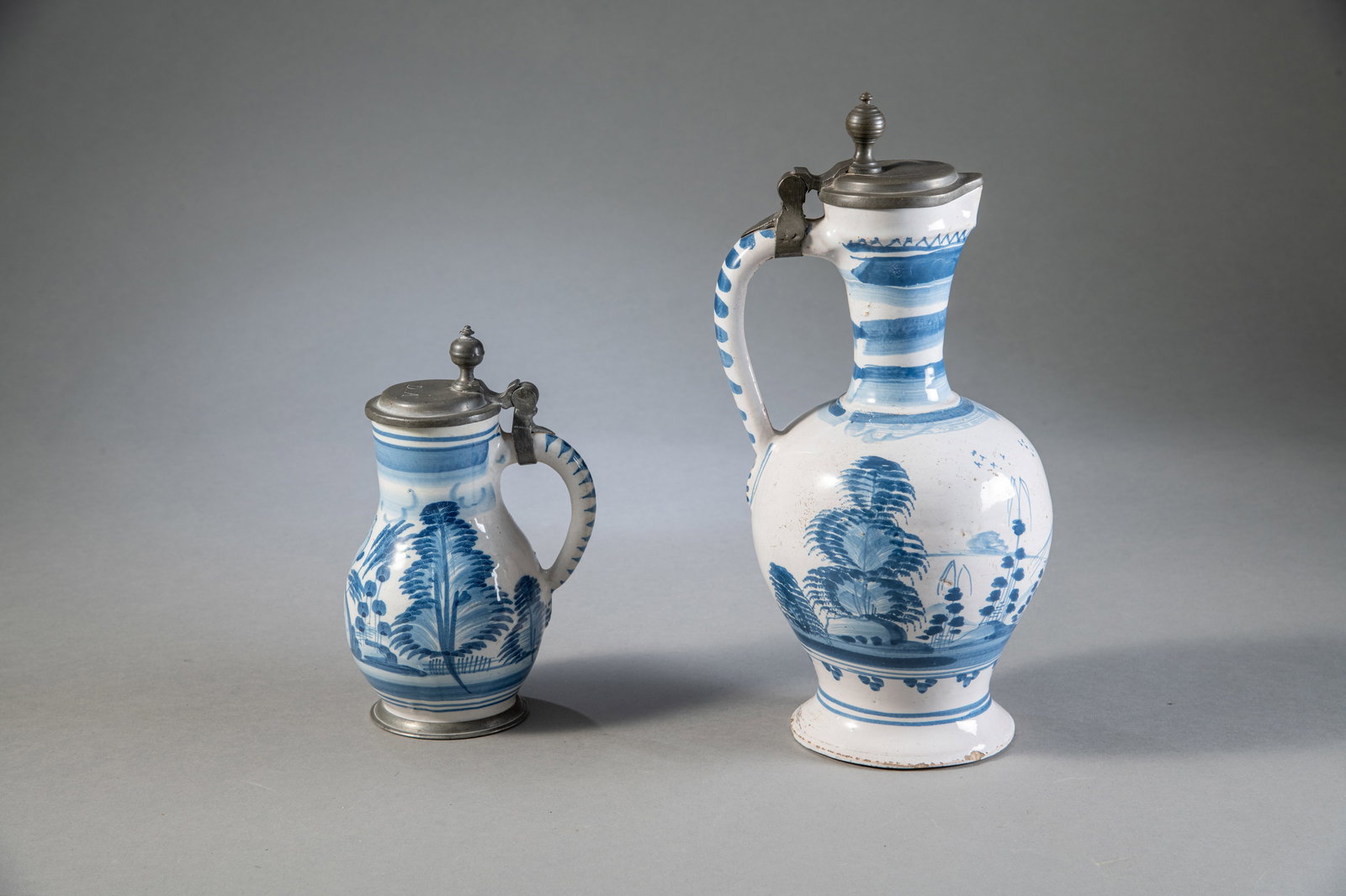 TWO PEWTER MOUNTED BLUE AND WHITE PAINTED FAIENCE JARS - 2
