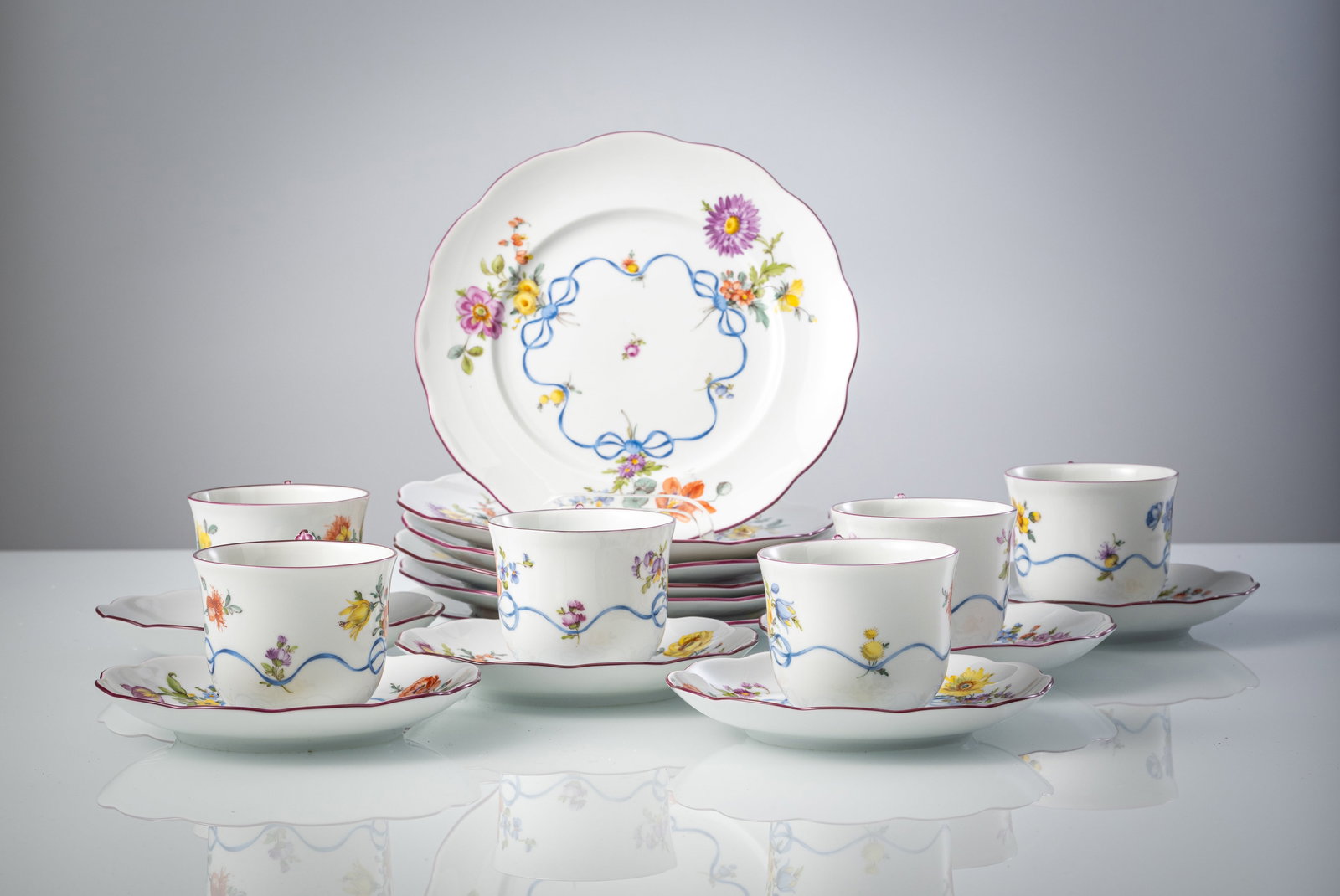 SIX SETS OF CUPS SAUCERS AND PLATES WITH FLORAL- AND BOW DECORATION - 2