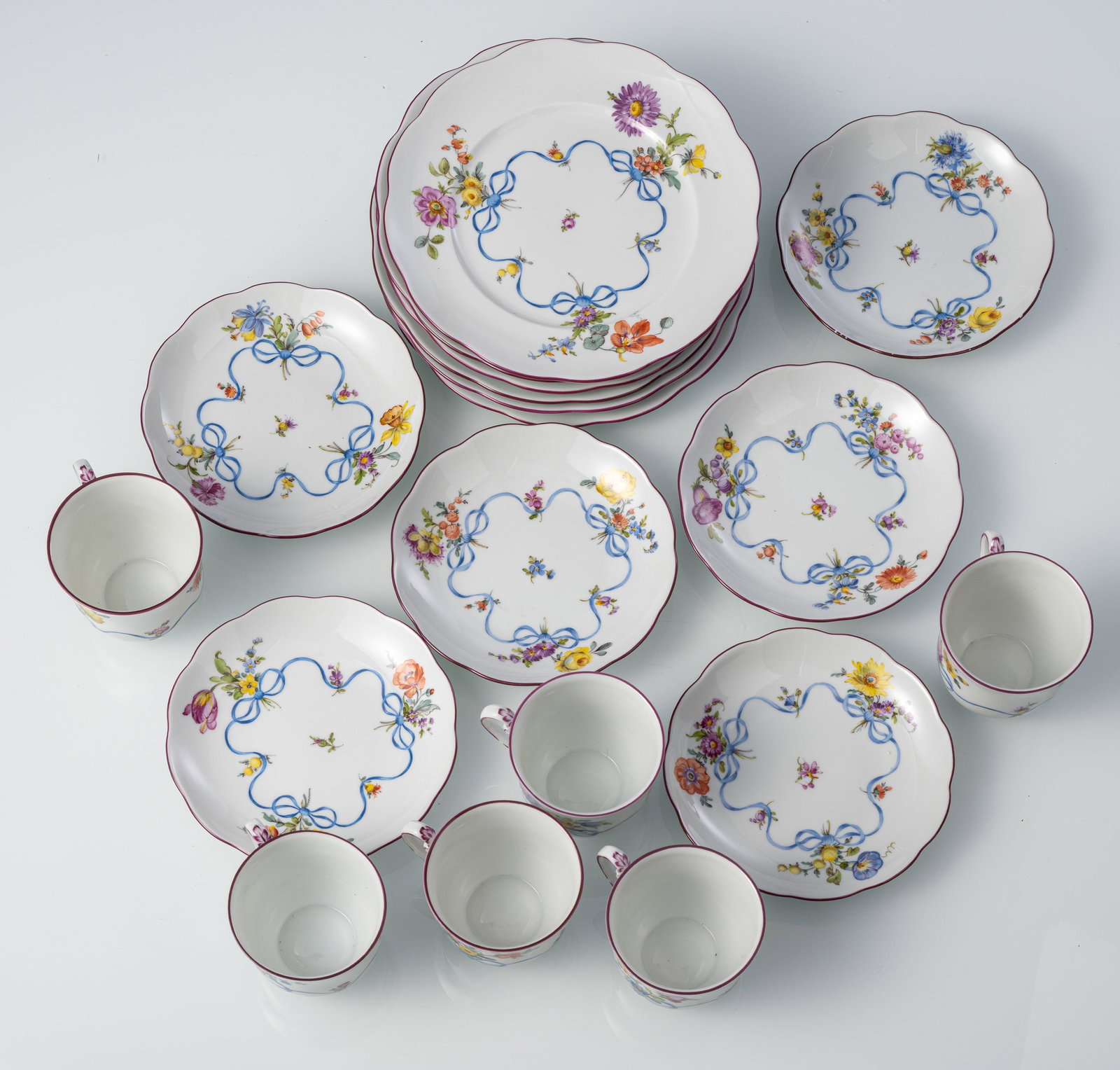SIX SETS OF CUPS SAUCERS AND PLATES WITH FLORAL- AND BOW DECORATION - 3
