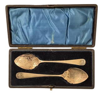 Vintage Pair of Sterling Silver Spoons with Fitted Box: This vintage set includes two sterling silver spoons, showcasing classic elegance and fine craftsmanship. Ideal for collectors or as a refined addition to a formal table setting, the set reflects time
