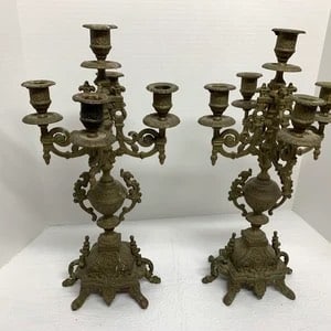 Gilt Bronze pair of Candelabras: Lovely pair of gilt bronze candelabras, paw feet, to lions roaring, to birds holding guard at the center, to 5 light candles. These have the style, the look, and the age.