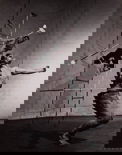 Martha Graham Dancers: In this electrifying signed photograph by Philippe Halsman, two male dancers from the Martha Graham Company are captured mid-motion—dynamic, expressive, and almost acrobatic in their form. Their bod
