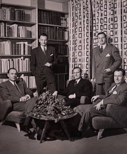 Rockefeller Brothers: In this 1949 group portrait by Philippe Halsman, the five Rockefeller brothers—John D. III, Nelson, Laurance, Winthrop, and David—are gathered in what appears to be a study or private library. Boo