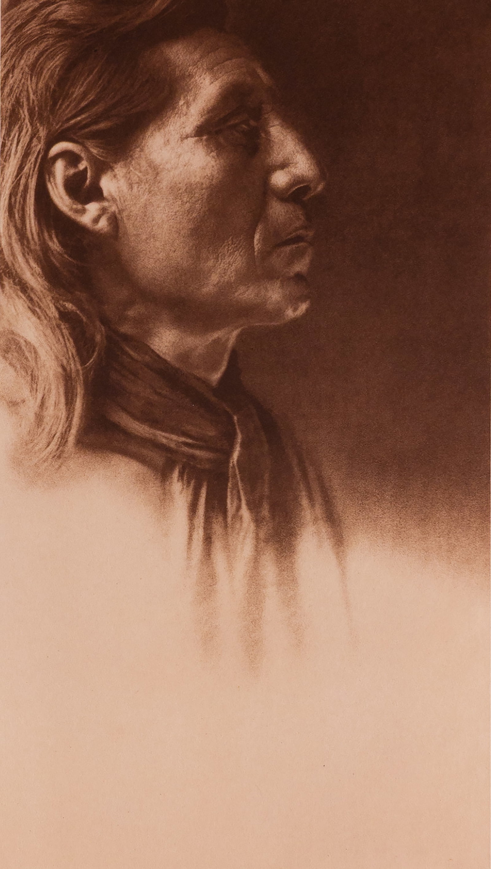 Little Sioux - Arikara: This late-period photogravure is printed on Holland Van Gelder paper, valued for its soft texture and warm tonal range. The paper’s durability and fine grain support Curtis’s delicate handling of 