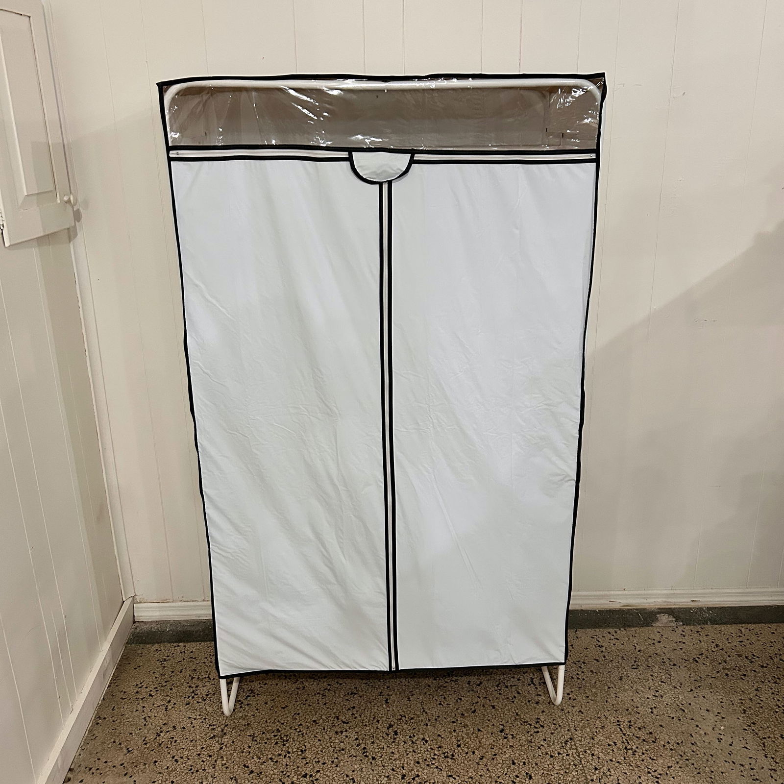 Enclosed Clothing Storage Rack: Item comes as pictured.