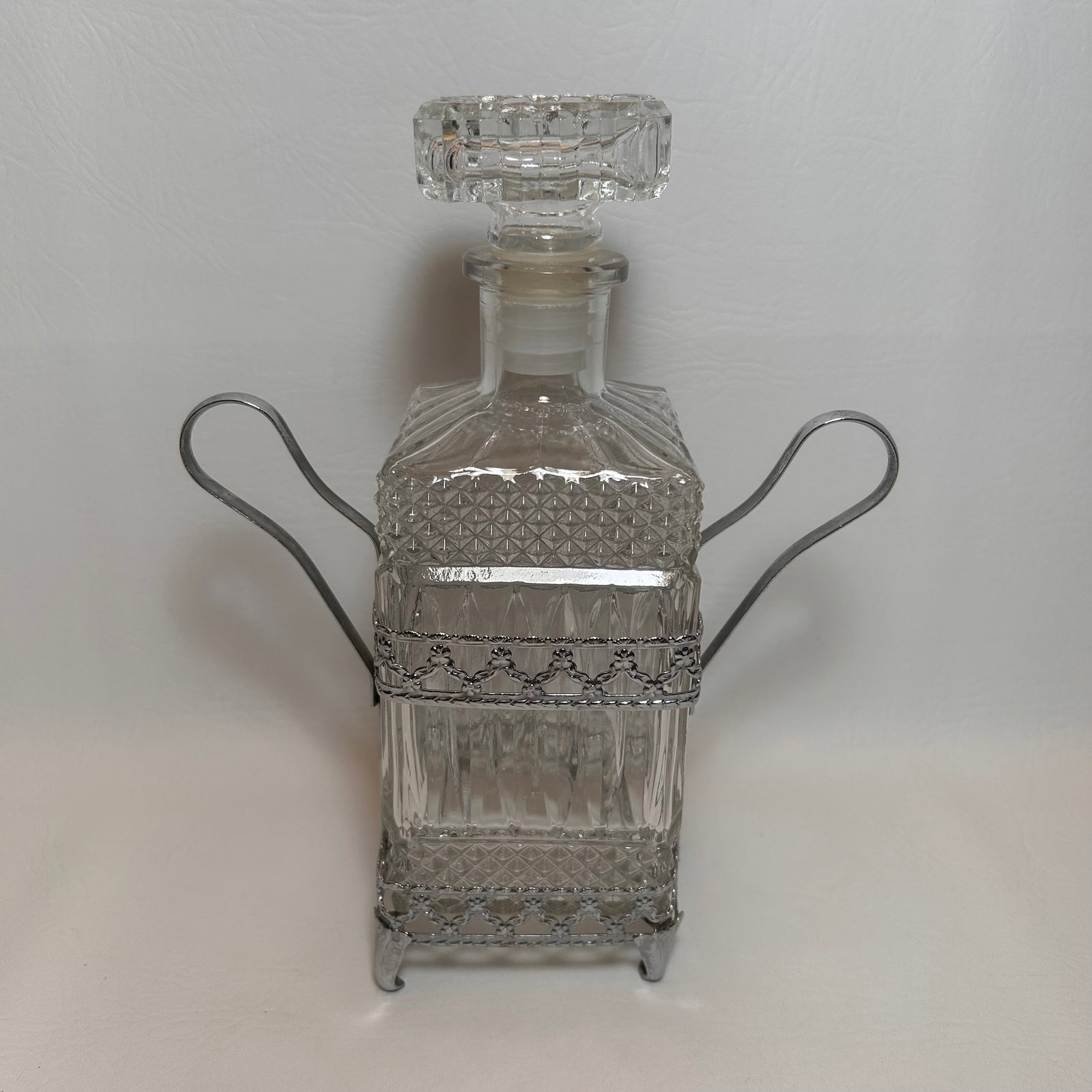 Vintage Glass Queen Anne Whiskey Decanter with Footed Frame: W8in D3.5in H10in