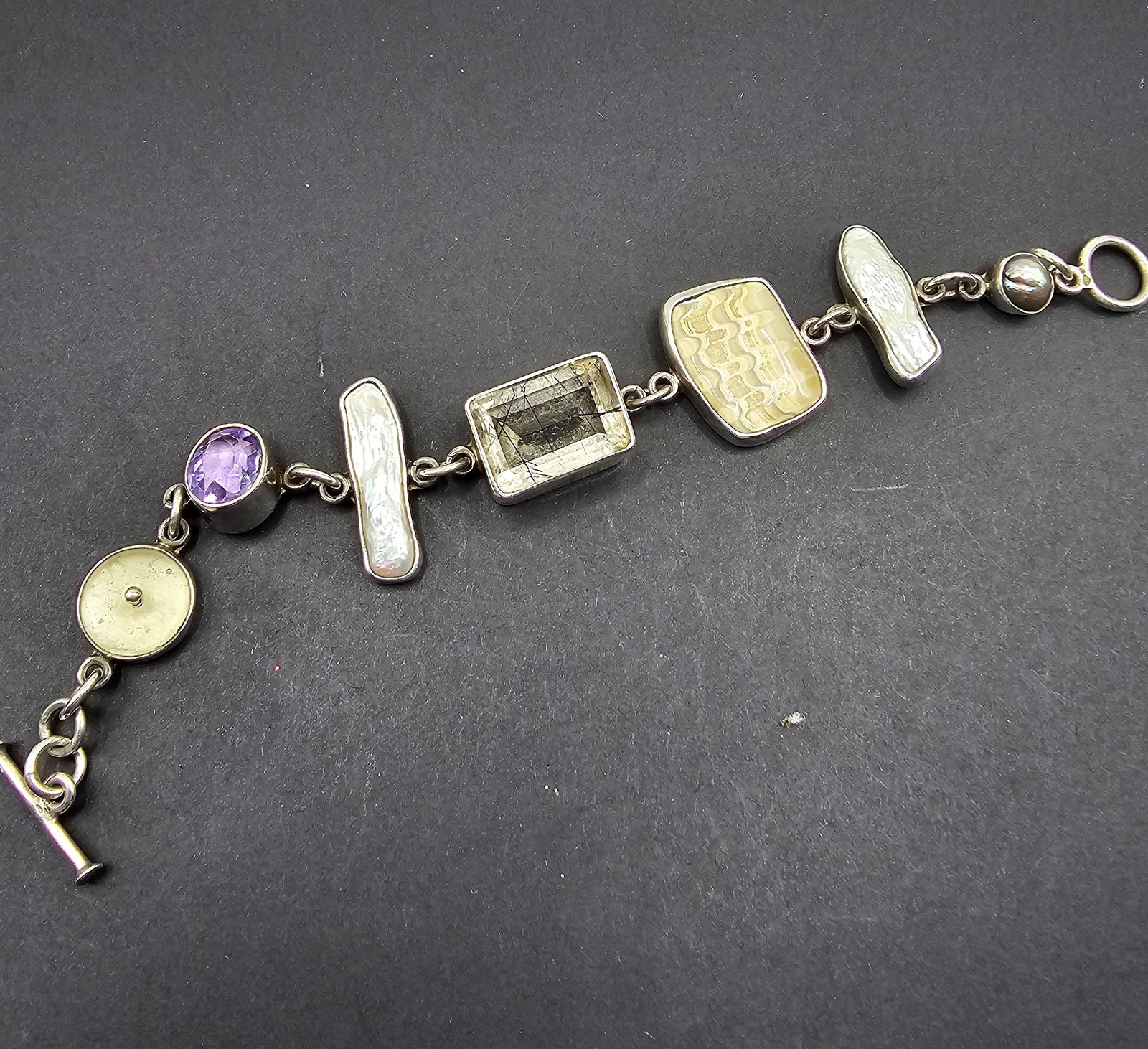 Sterling Bracelet with Smoky Topaz, Amethyst, and more: 31.83 grams