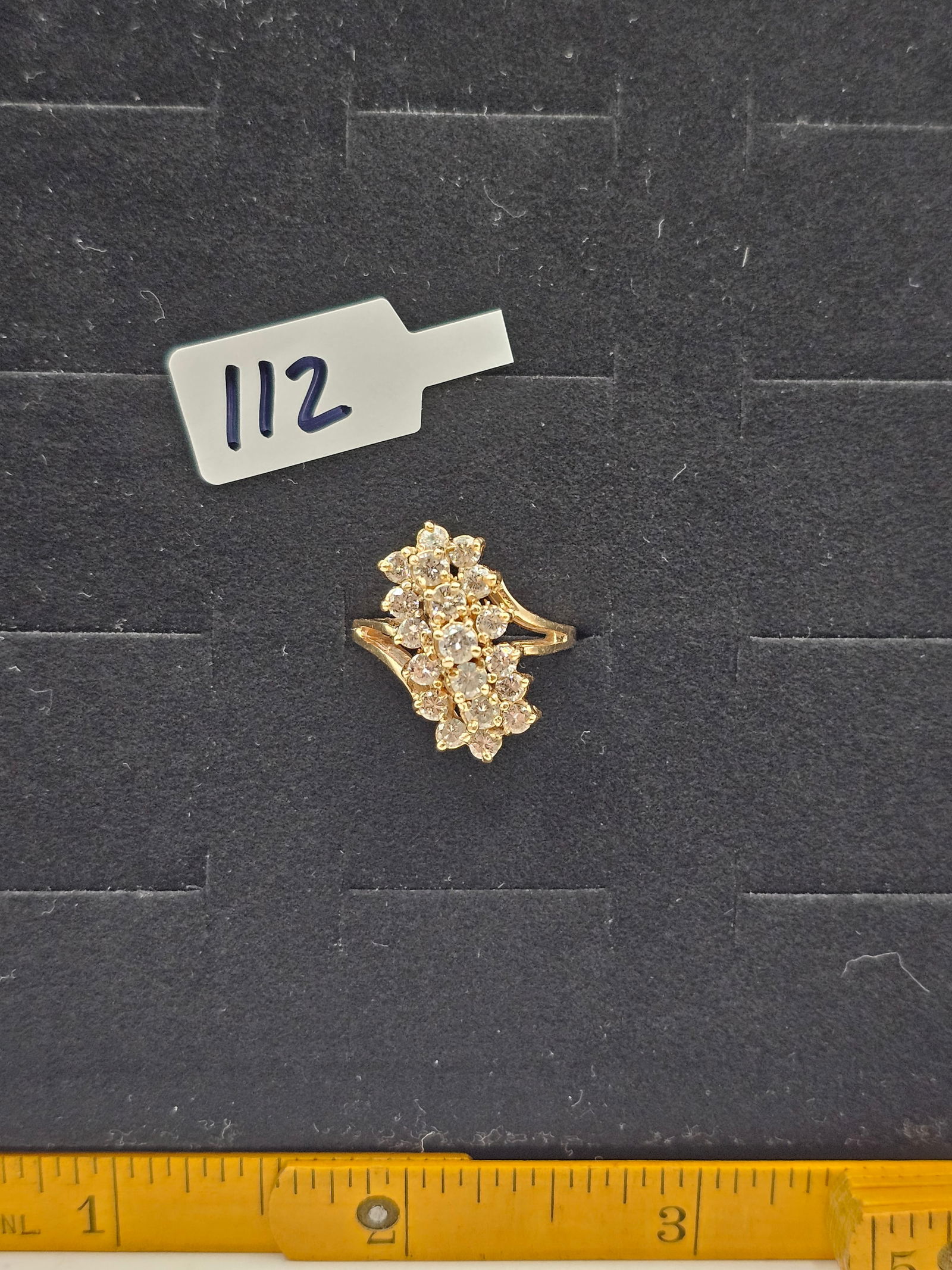 14k Yellow Gold and Diamond Ring: 19 good sized diamonds