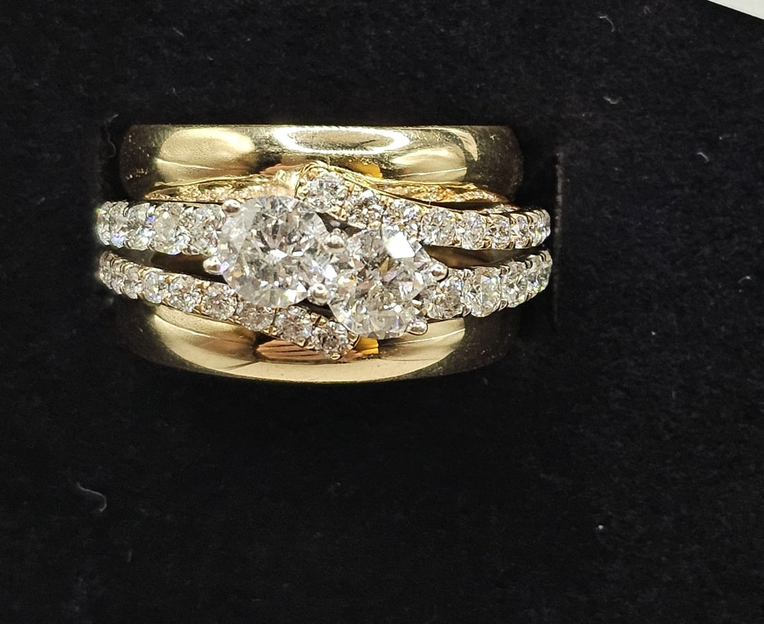 14k and 10k 3 Band Wedding Ring Set with Diamonds: Stones: Full-cut diamonds weighing a total of approximately 2.00 caratsMetal: 14k white gold and 10k yellow goldMarked: Sai and BenchmarkGross Weight: 11.20 gramsSize: 7 (not sizeable)Condition Report