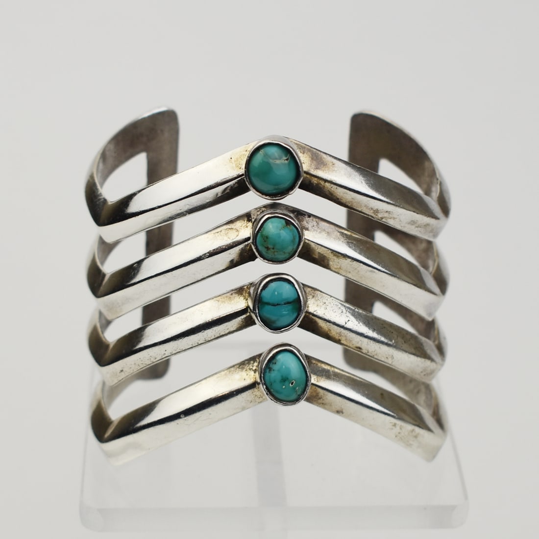NAVAJO CAST SILVER OPENWORK BRACELET WITH BEZEL-SET TURQUOISE, C. 1960 (1 of 4)