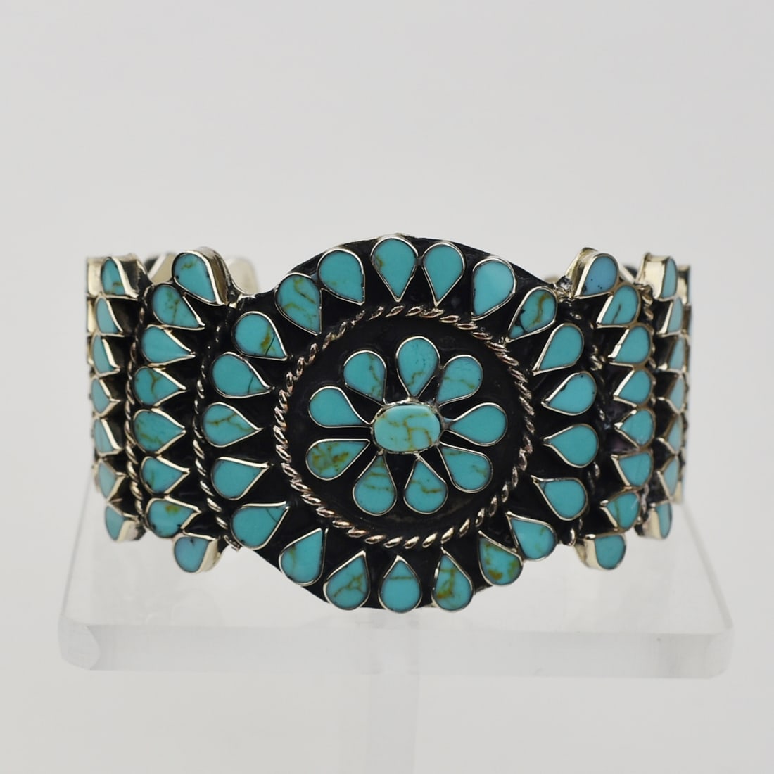 DISHTA-STYLE ZUNI SILVER AND TURQUOISE BRACELET C.1970s: Dishta-style Zuni silver and turquoise bracelet c. 1970s. Not hallmarked, but the flat inlay is typical of the work done by the Dishta family. HALLMARKS: None WEIGHT:50 grams. DIMENSIONS: Inside size 