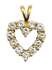 Diamond Heart Pendant in 18 Karat Yellow Gold