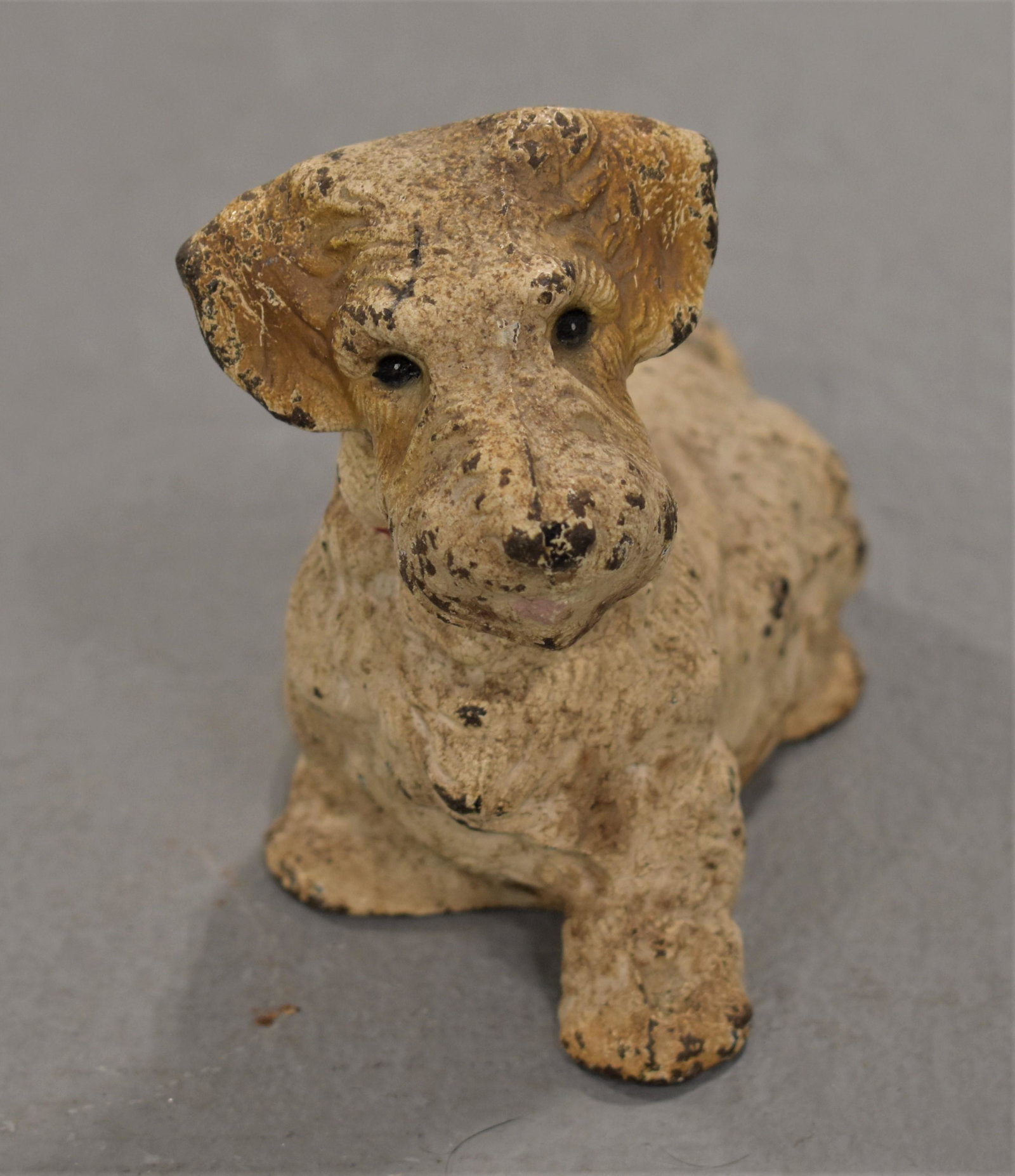 Sealyham Terrier Painted Cast Iron Doorstop: 6 1/2" HUBLEY SEALYHAM TERRIER PAINTED CAST IRON DOORSTOP- 6 1/2" L X 4 1/4" T - WEAR AND LOSSES TO PAINT, IMPERFECTIONS