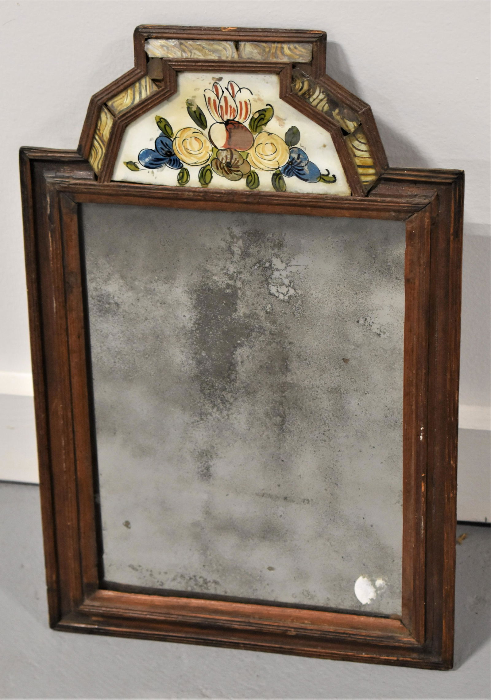 Early Continental Courting Mirror: 18TH CENTURY CONTINENTAL COURTING MIRROR WITH REVERSE PAINTED UPPER TABLET WITH FLOWERS- 15 3/4" X 10 1/2"- WEAR AND LOSSES TO GLASS UPPER, SILVERING LOSSES TO MIRROR AND IMPERFECTIONS
